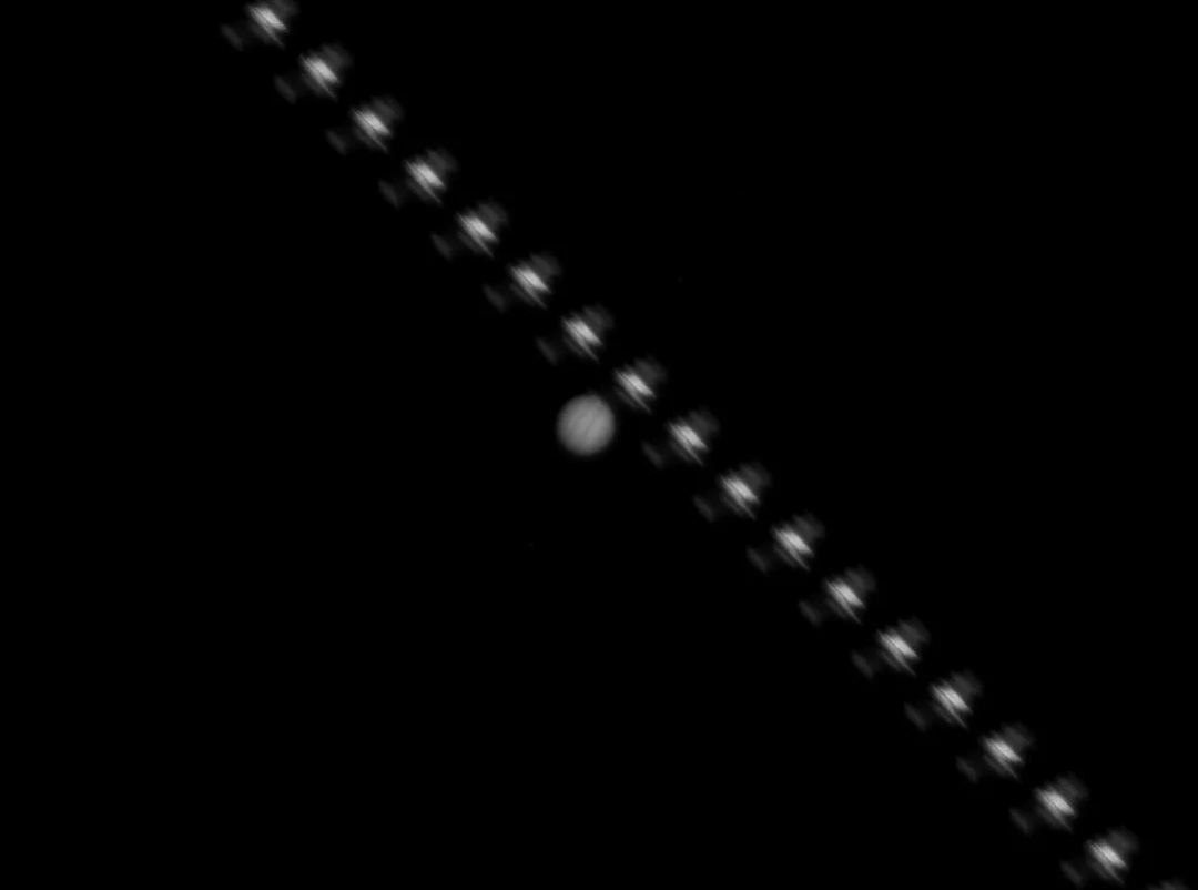 Framed moments of the International Space Station (ISS) with Jupiter